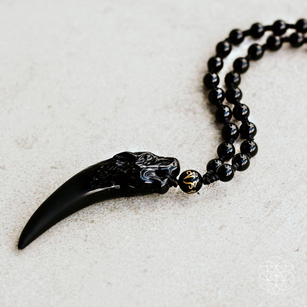 The Obsidian Wolf Pendant - Collective Awakening