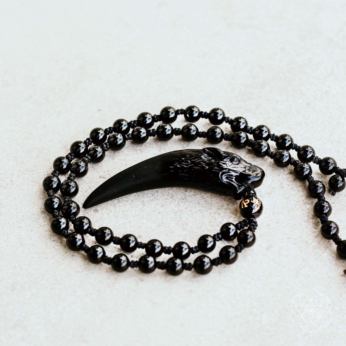 The Obsidian Wolf Pendant - Collective Awakening