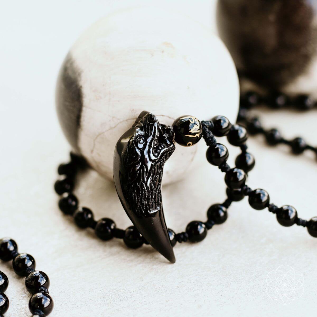 The Obsidian Wolf Pendant - Collective Awakening
