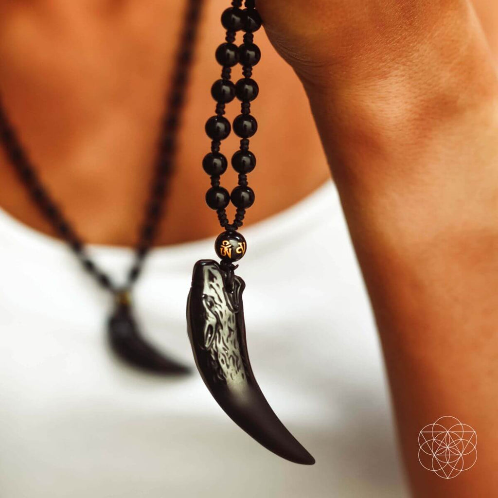 The Obsidian Wolf Pendant - Collective Awakening